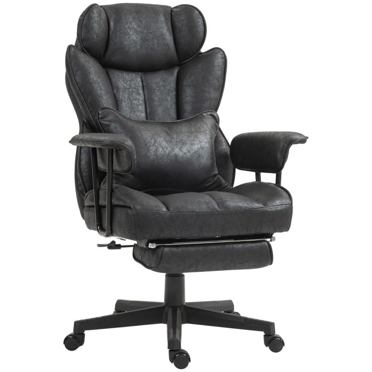 Black executive office chair with padded headrest, armrests, and retractable footrest