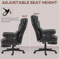 Black adjustable height office chair with tall backrest and padded armrests