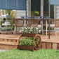 Wooden wagon planter box on patio deck with three stacked planting sections
