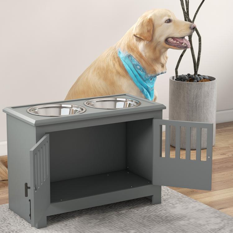 Gray dog feeding cabinet with two stainless steel bowls and open storage compartment