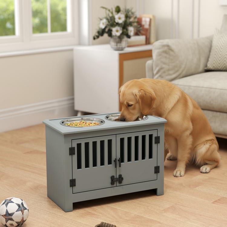 Gray dog feeding cabinet with two top bowls and open front storage door