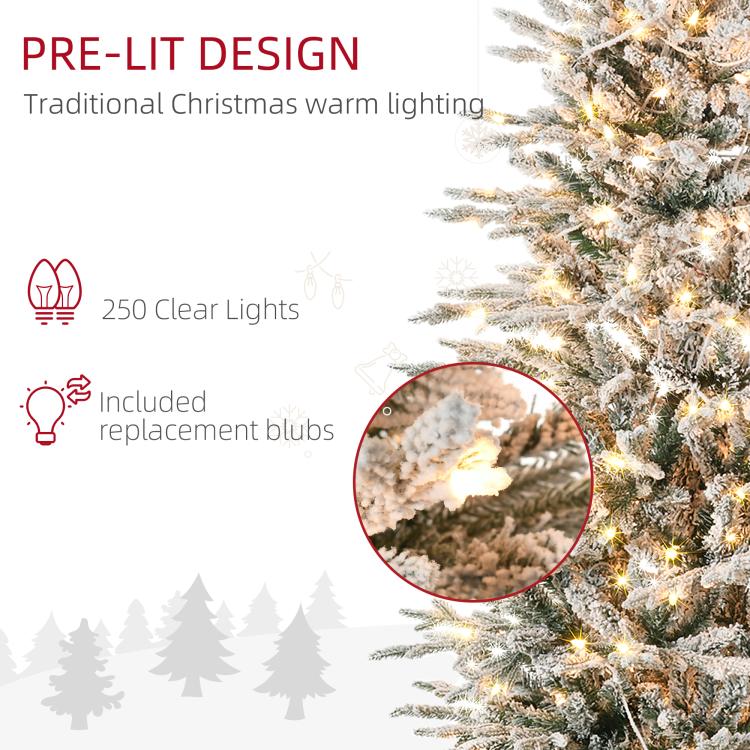 Snowy artificial Christmas tree branch with warm clear LED lights