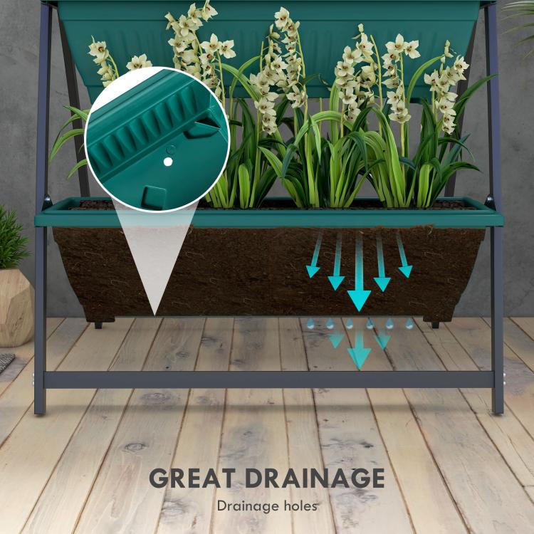 Green planter box with drainage holes shown under the front shelf; flowers inside