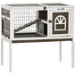 Coffee-colored elevated wooden rabbit hutch cage with wire mesh door and access panels