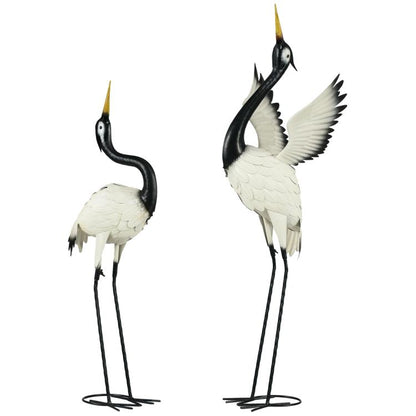 Set of 2 metal heron garden sculptures, black necks and white feather bodies on stands