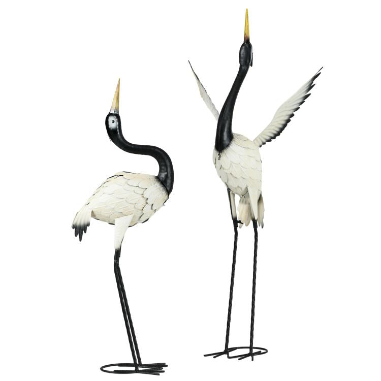 Set of 2 metal heron garden sculptures with curved black necks and white wings