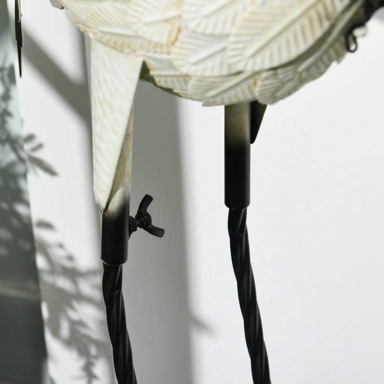 Set of 2 heron garden sculptures, black metal stand legs and curled foot bases