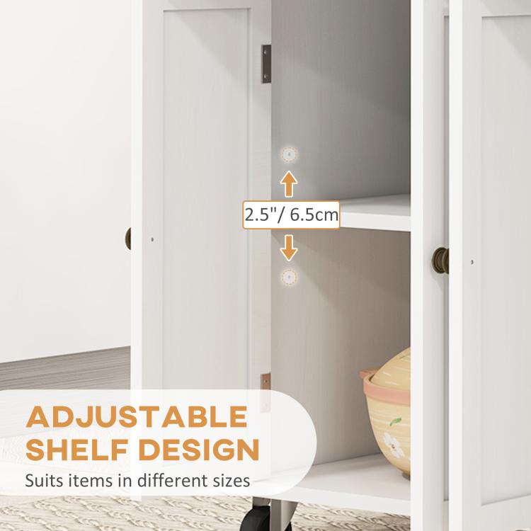 Adjustable shelf inside white cabinet doors on rolling kitchen island cart