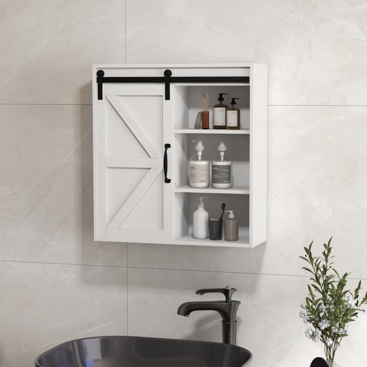 White wall medicine cabinet with sliding door open, bottles and dispenser on shelves
