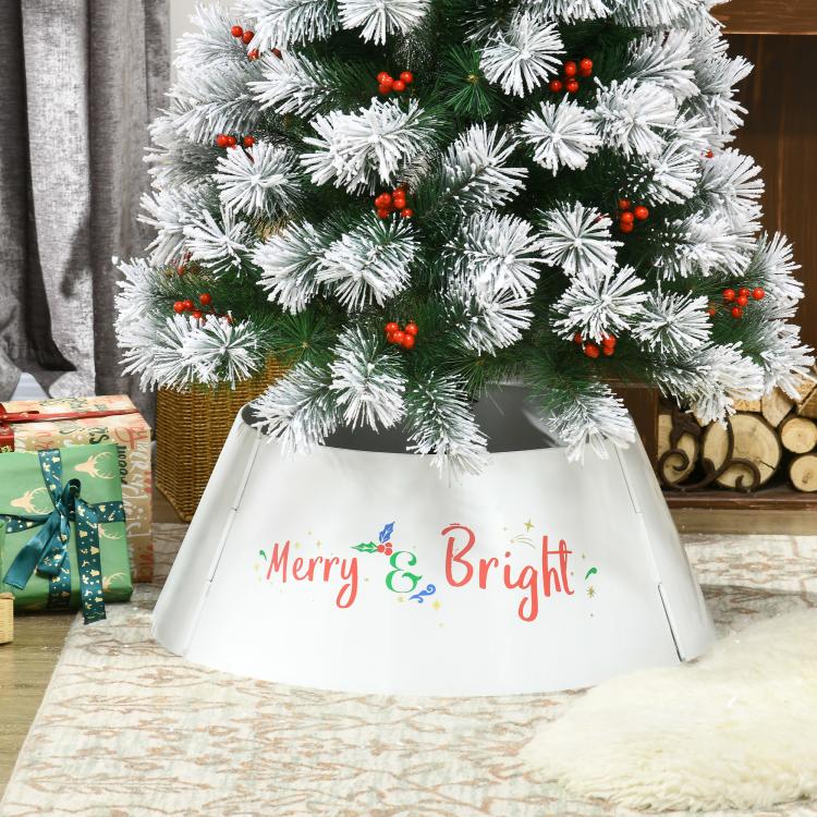 Cream white tree skirt collar on Christmas tree base with “Merry & Bright” front