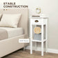 White side table with drawer and open shelf next to a couch, showing sturdy construction.
