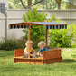 Outdoor wooden kids sandbox with striped canopy and bench seats, children playing