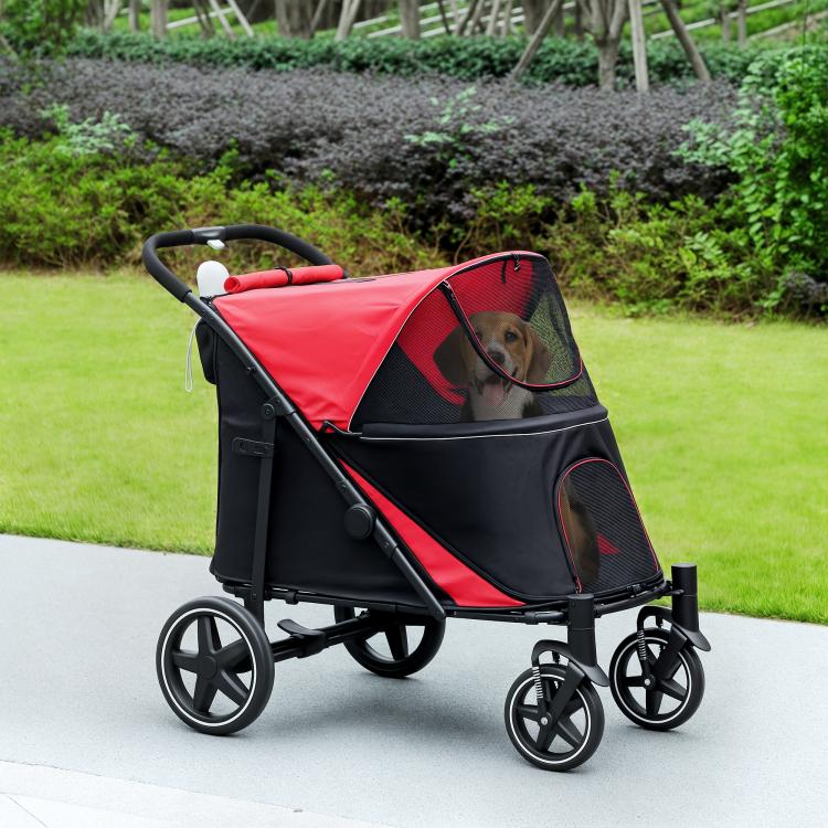 Red and black dog stroller with side mesh panel and reclining canopy, four wheels