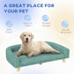 Green pet sofa bed with cushioned surface and wooden legs for everyday rest