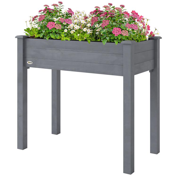 Elevated dark gray wooden planter box with open sides and planted flowers