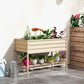 Cream metal raised garden bed on legs with lower shelf and potted plants on patio