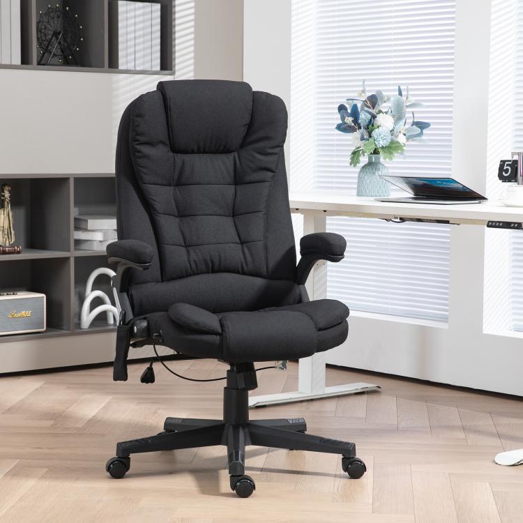 Black massage desk chair with tall headrest, padded armrests, and recline lever