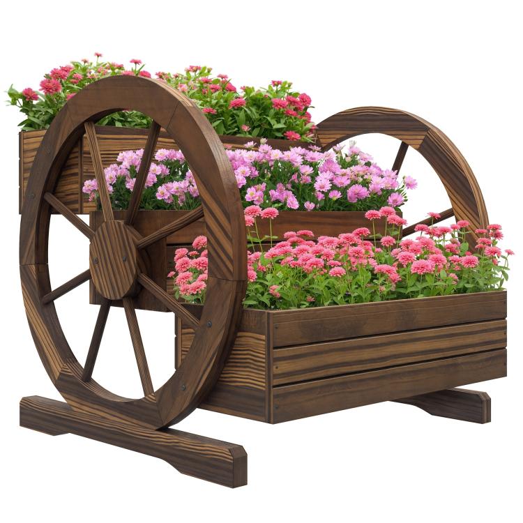 Wooden wagon-style planter box with three tiers and two front wheels, with pink flowers