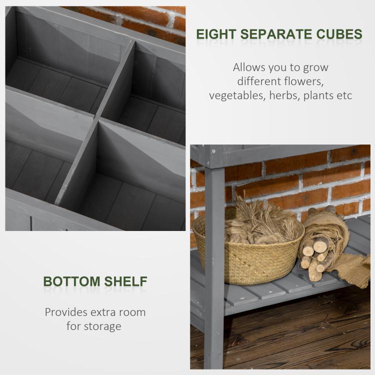 Dark gray raised garden bed showing divided inner compartments and bottom shelf