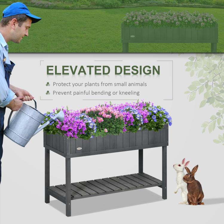 Dark gray elevated garden planter bed with open lower shelf and raised legs