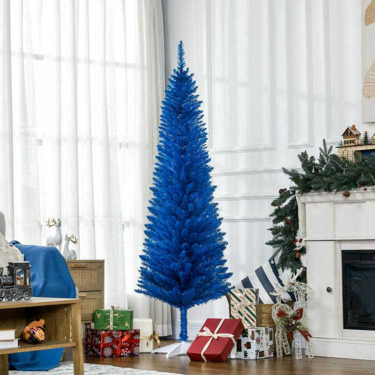Tall blue pencil Christmas tree standing with white plastic base indoors