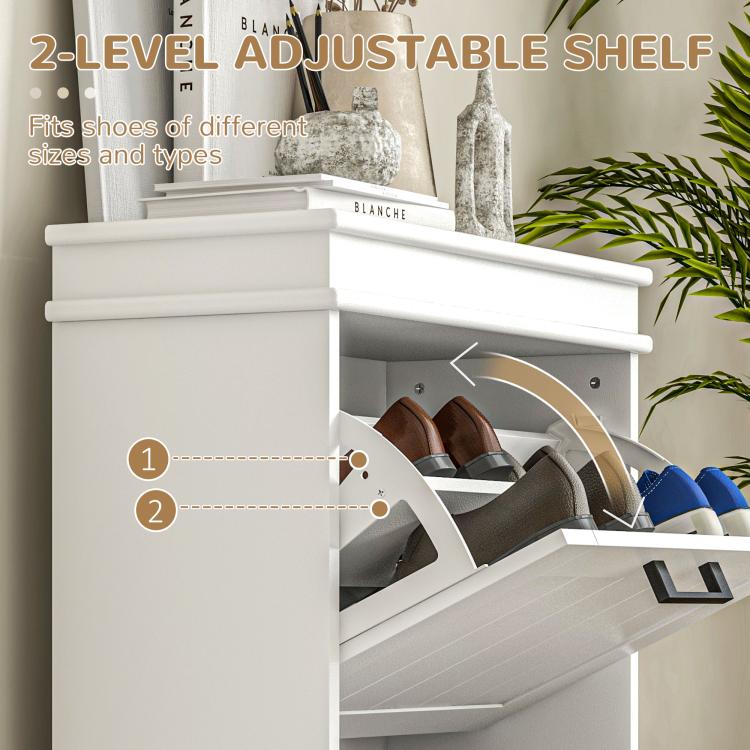 Open white flip-drawer shoe cabinet showing shoes on adjustable two-tier shelf
