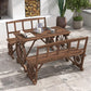 Brown wagon-wheel dining table with two long bench seats