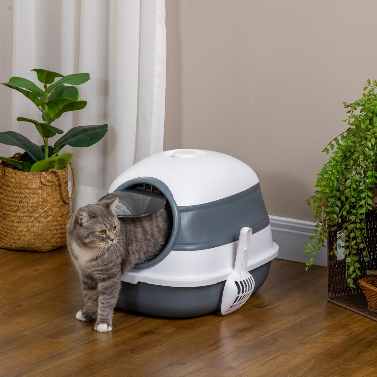 Covered cat litter box with dome lid, white and gray, cat at front entrance