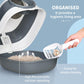 Cat litter box interior with high rim, white scoop and gray base