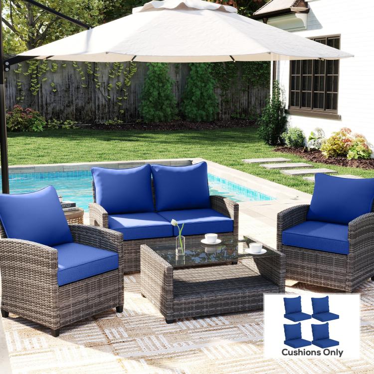 Navy blue patio chair seat and back cushions on outdoor lounge chairs