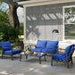 Navy blue seat and back cushions on patio chairs around a table
