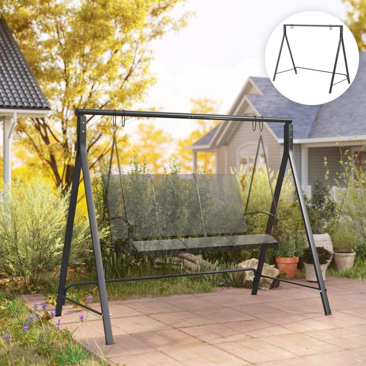 Black metal swing stand with hanging chains and bench swing seat outdoors