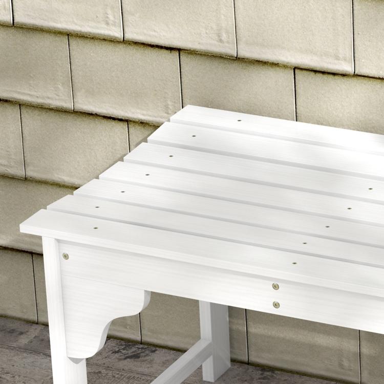 Close-up of white slatted wooden bench seat and curved front legs