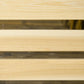 Light wood slatted swing plank detail with smooth surface texture