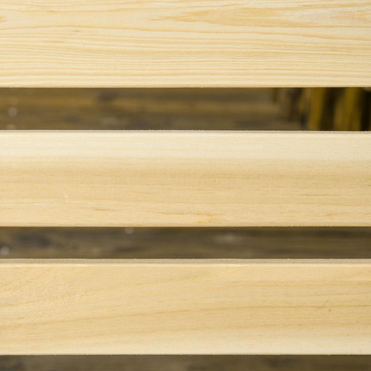 Light wood slatted swing plank detail with smooth surface texture