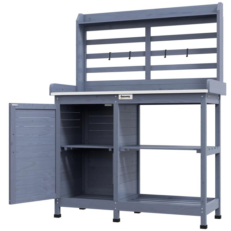 Gray potting bench with open storage cabinet and slatted back tool hooks