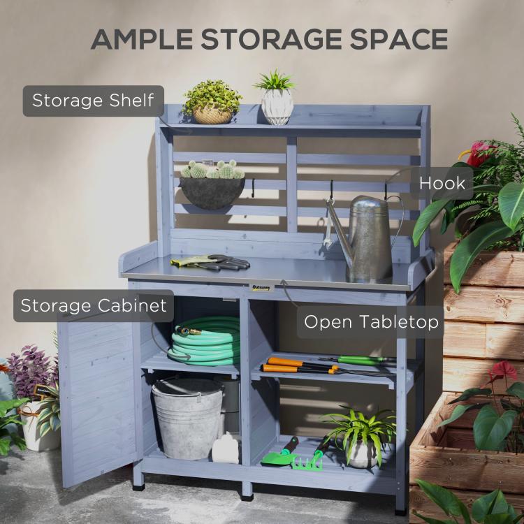 Gray potting bench with open tabletop, storage shelf, and cabinet compartments