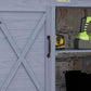 Gray wooden potting bench with hinged storage door and metal latches