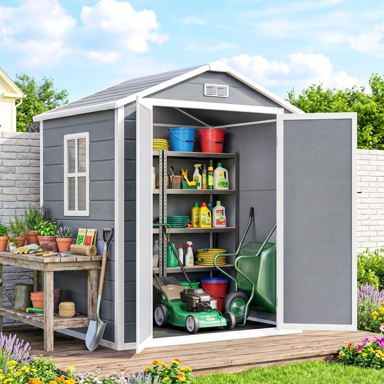Open gray utility shed with interior shelves for garden tools and supplies