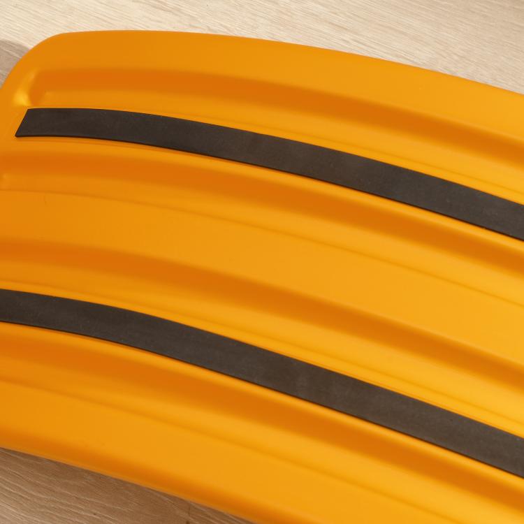 Orange balance board with dark grip insets
