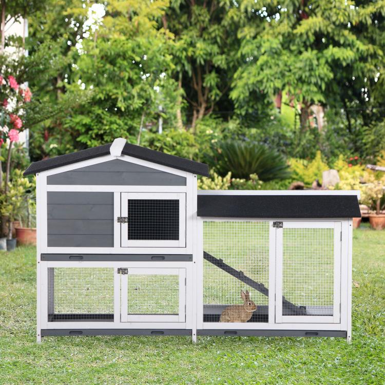 2-tier rabbit hutch with ramp and enclosed compartments, black tops and mesh fronts