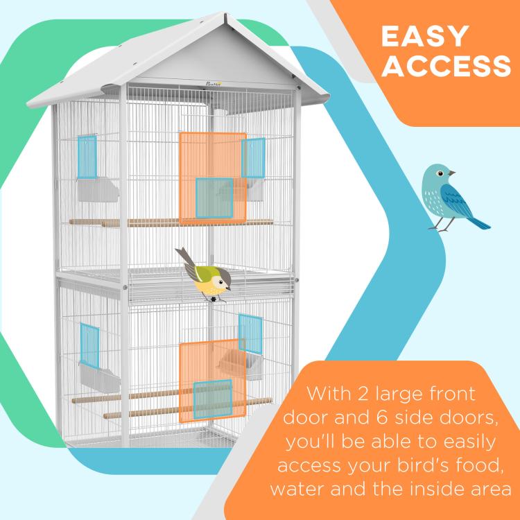 White bird cage showing two large front doors and interior feeder cups