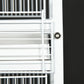 White metal bird cage door latch and wire bars at the front opening