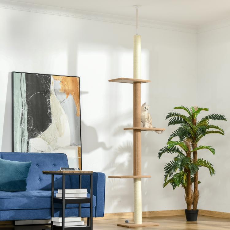 Light brown floor-to-ceiling cat tree with sisal-covered posts and stacked perches