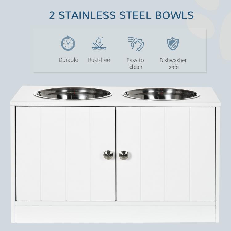 White dog feeding cabinet featuring two stainless steel bowls on the top