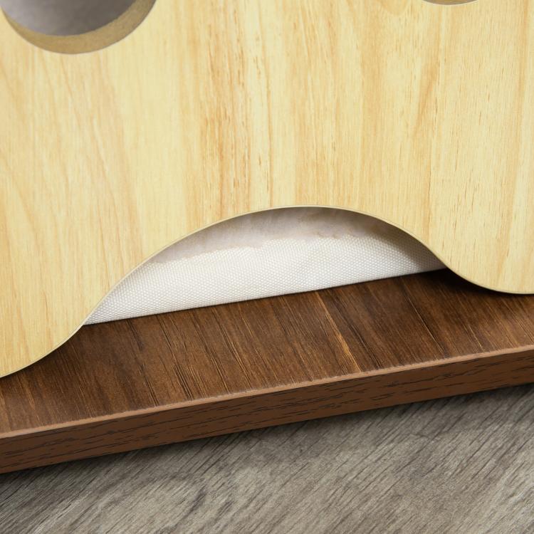 Brown dog crate end table with light cushion inside the arched opening