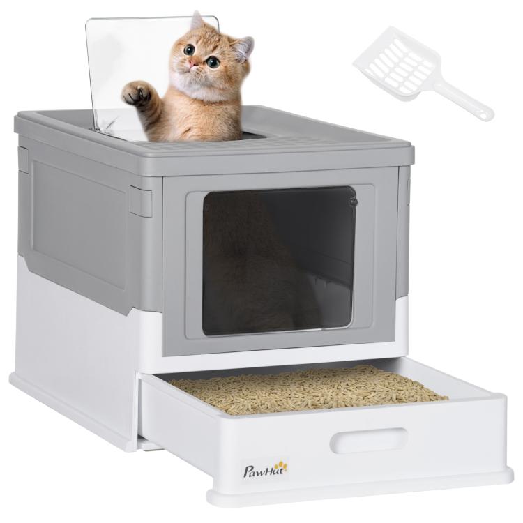Gray enclosed cat litter box with front opening; cat sits inside near open tray