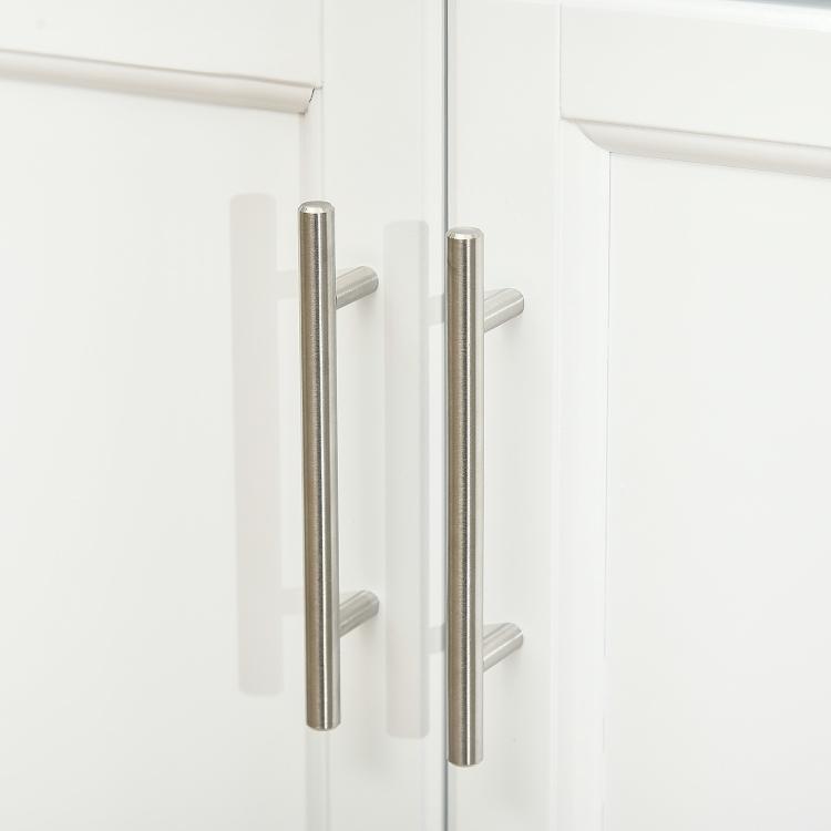 White rolling kitchen cart edge with two metal pull handles and side panel