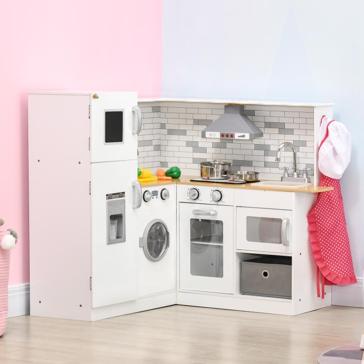 White corner kids play kitchen set with range hood, cooktop, sink faucet, and hanging apron