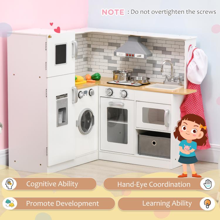 White corner kids play kitchen set with sink, cooktop, oven doors, and range hood